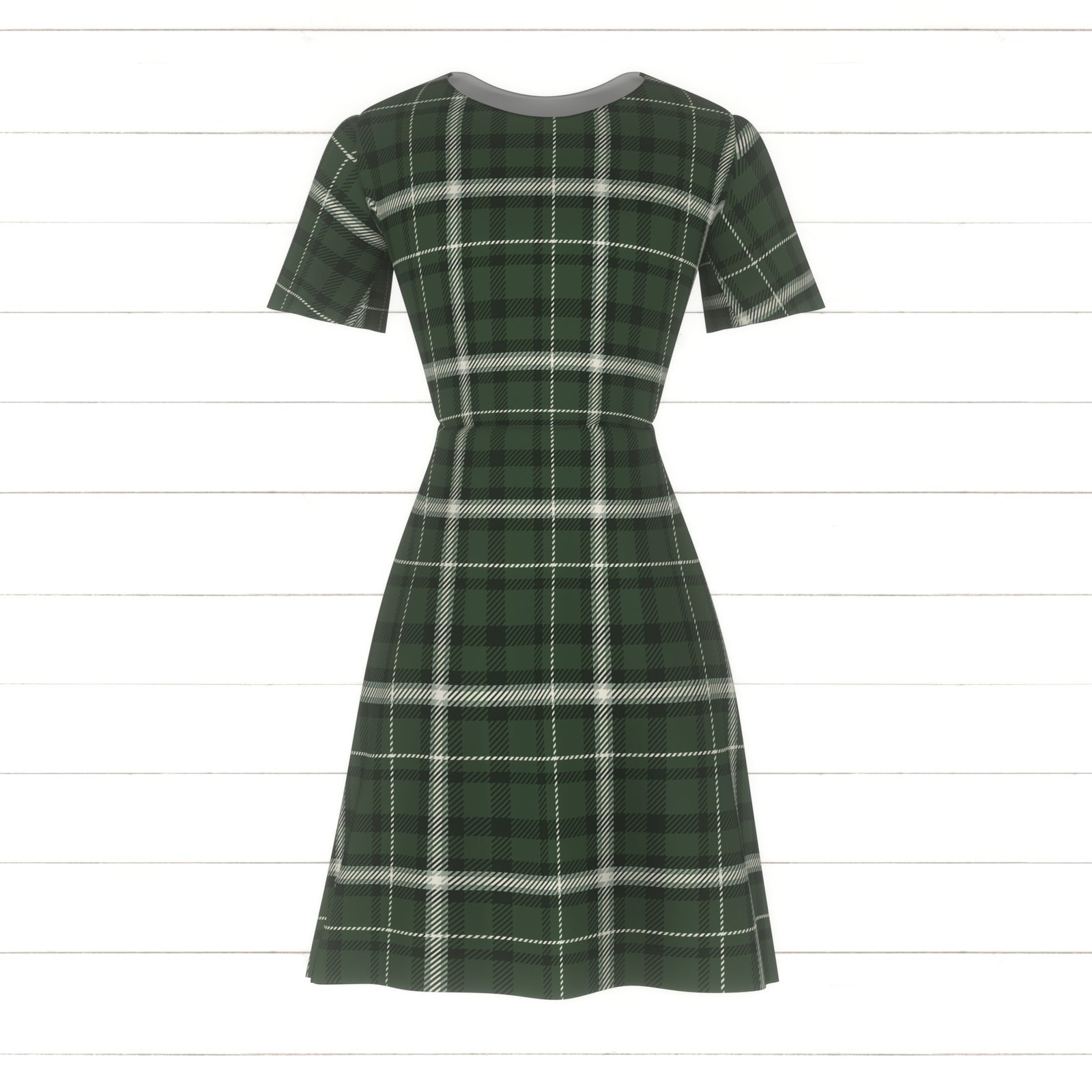 Plaid in green, cream and black with a british racing green background