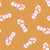 Flip-flops pink and white on ochre background Image