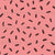 Tossed summer watermelon seeds on dark pink background Image