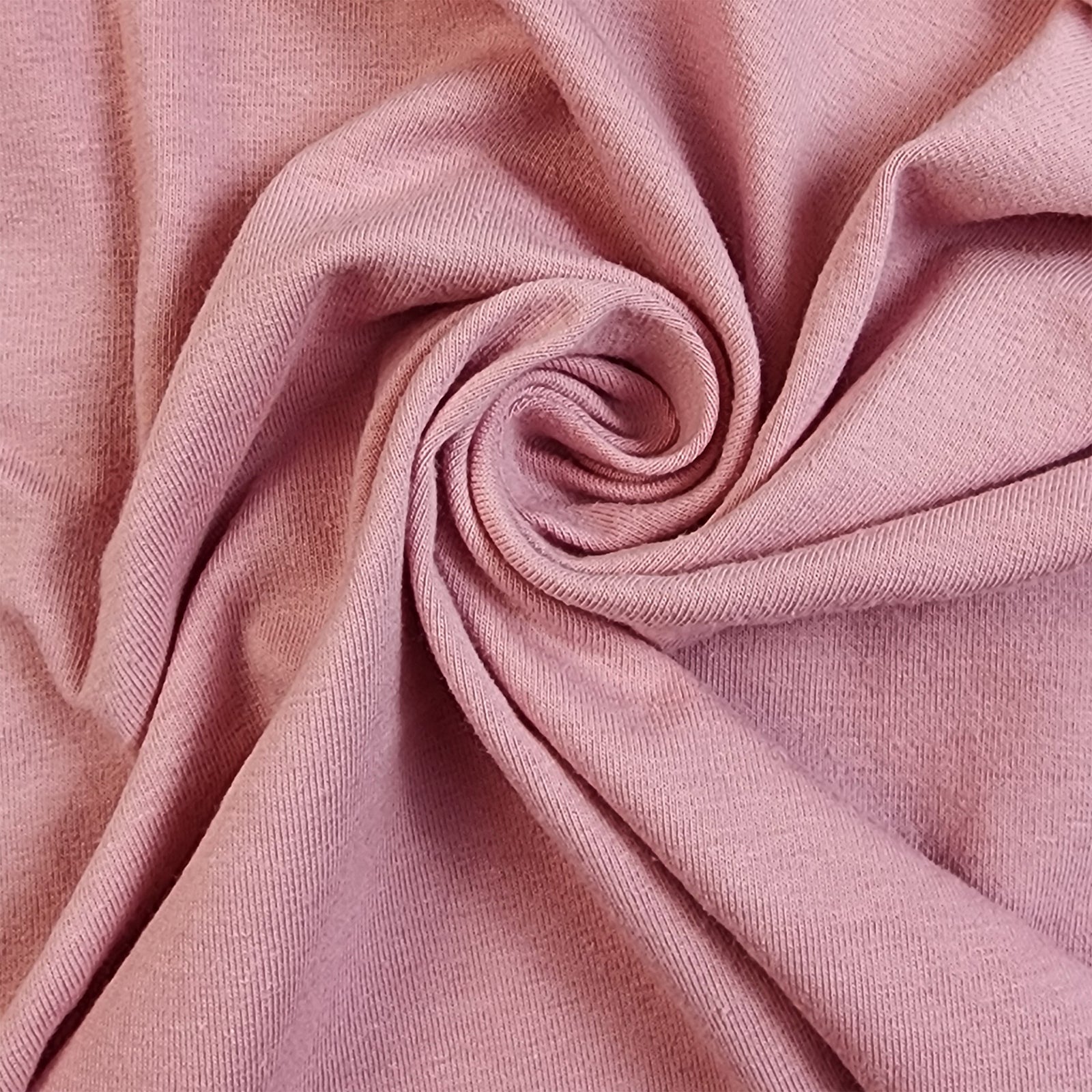 Solid Dusty Pink 4 Way Stretch 10 oz Cotton Spandex Jersey Knit Fabric.
