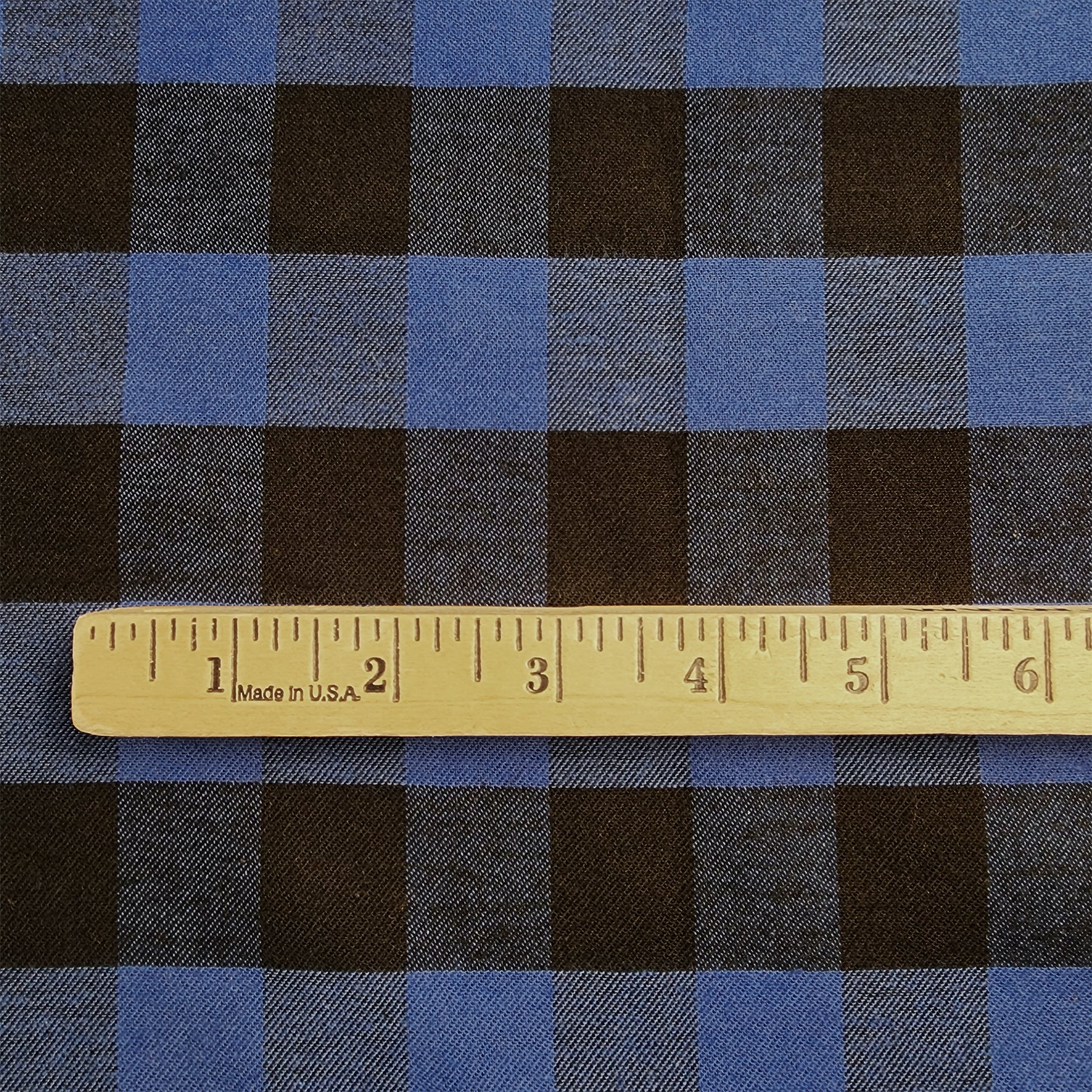 Blue and Black Buffalo Check Flannel Shirting with ruler