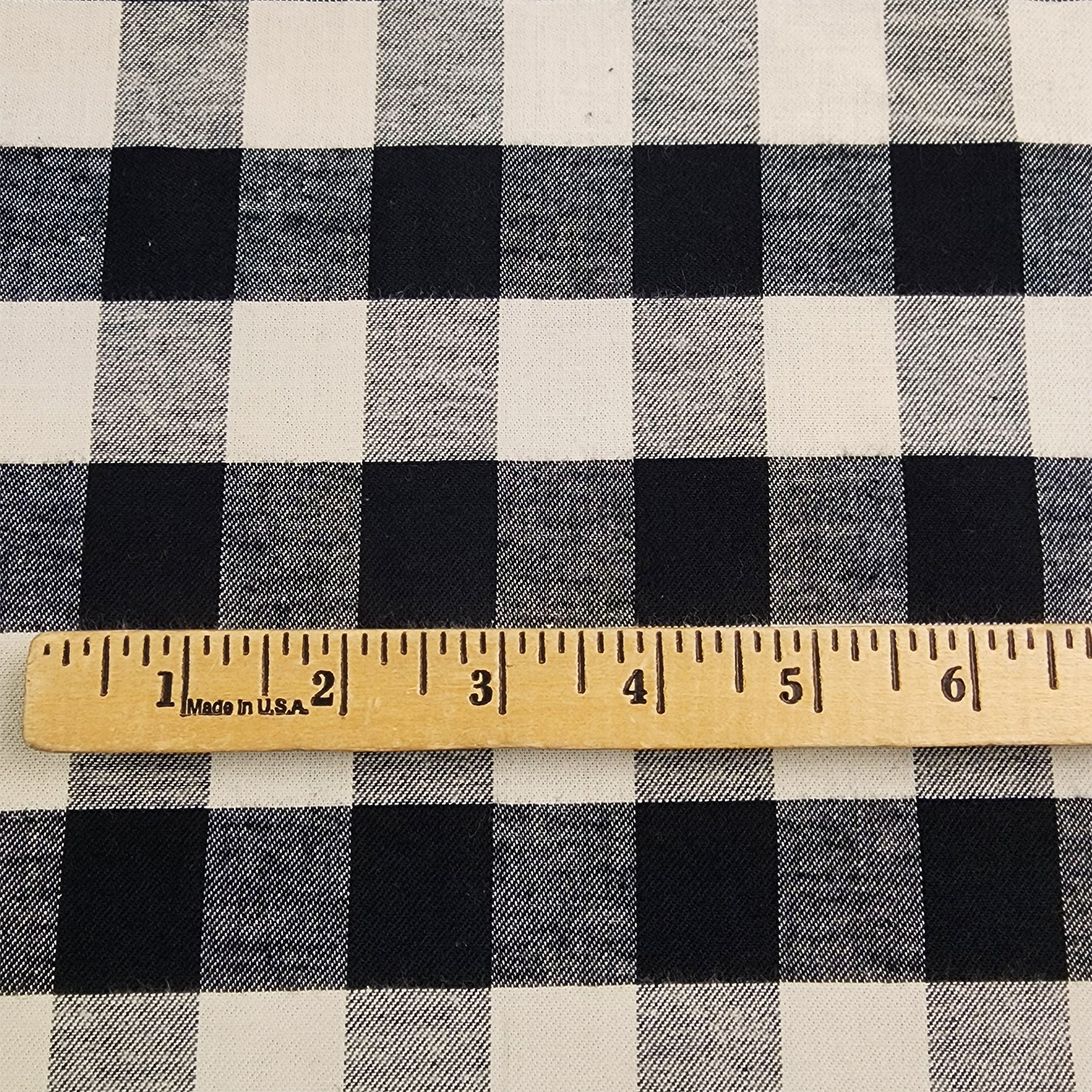 Black and Cream Buffalo Check Flannel Shirting with ruler
