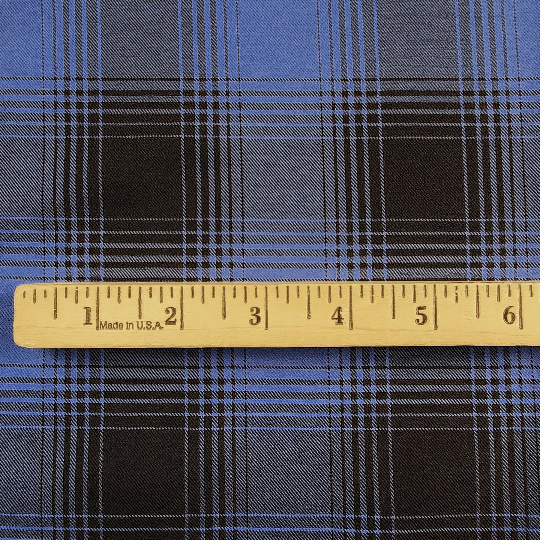 Blue and Black Plaid Flannel Shirting with ruler