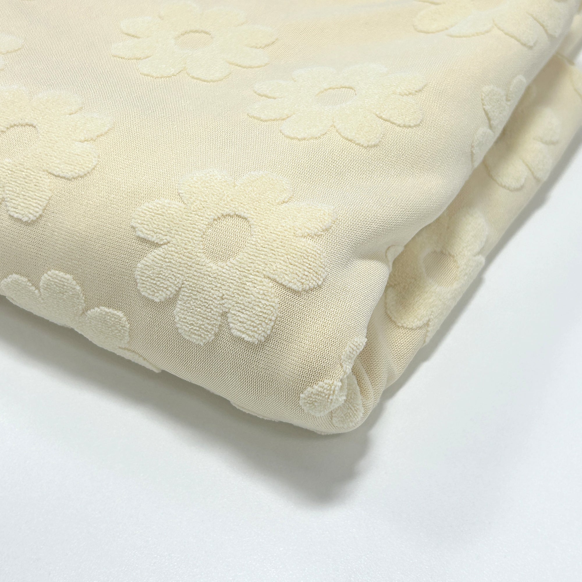 Solid Cream Daisy Stretch Jacquard Loop Terry Fabric