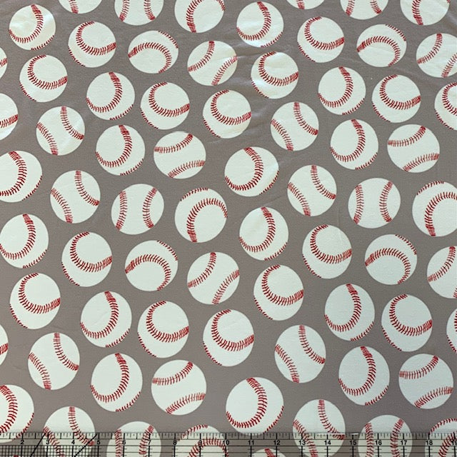 **Flawed**Light Grey Red and White Tossed Baseball Print Fabric On Lightweight Double Brushed Polyester