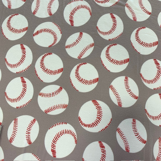 **Flawed**Light Grey Red and White Tossed Baseball Print Fabric On Lightweight Double Brushed Polyester