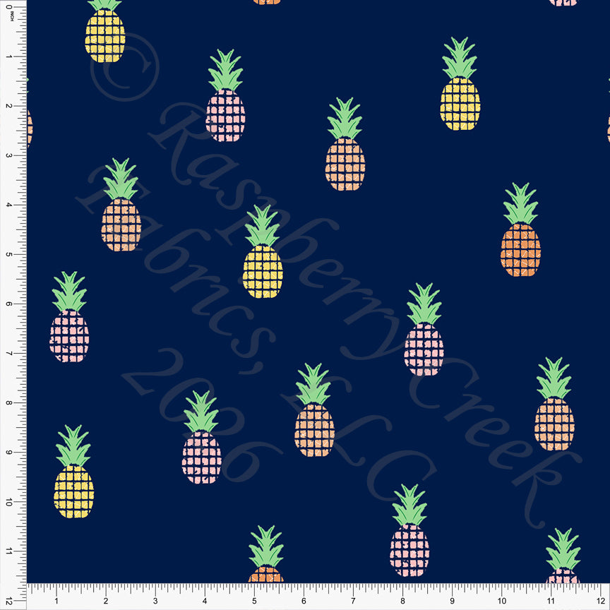 Pattern of pineapples on a navy blue background with a ruler for scale.
