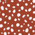 Cheetah spots on red background Image