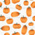 Tonal orange and green tossed pumpkins Image