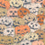 Jack-o'-lanterns grouped in vintage orange brown. Image