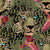 Leopard hiding in the tropical forest with bold flowers and palm leaves part of the Tropical friends collection. Image