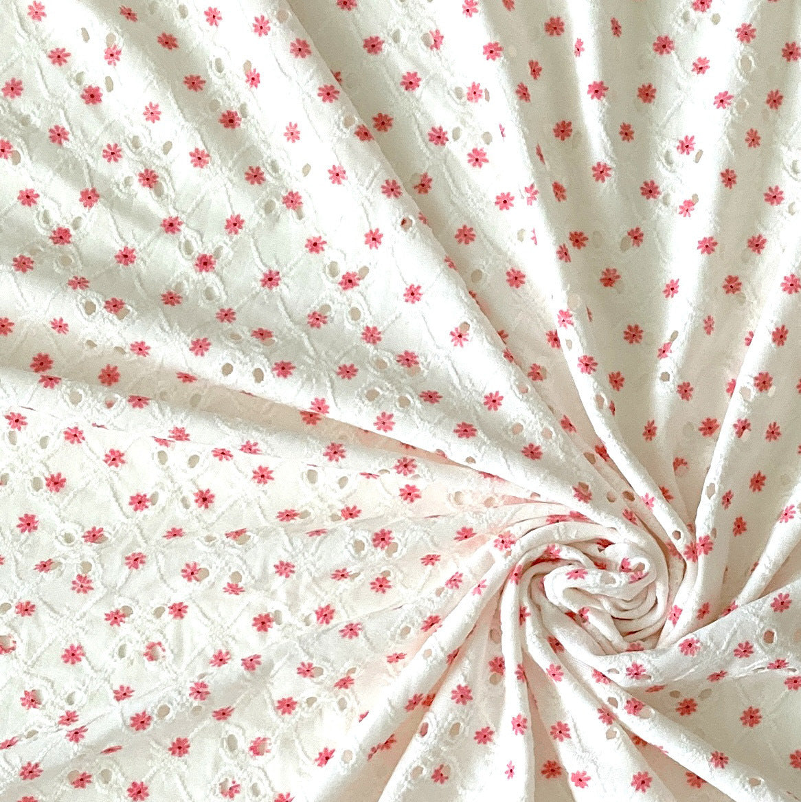 Off White and Salmon Pink Daisy Print Eyelet Poly Spandex Knit Fabric, Raspberry Creek Fabrics