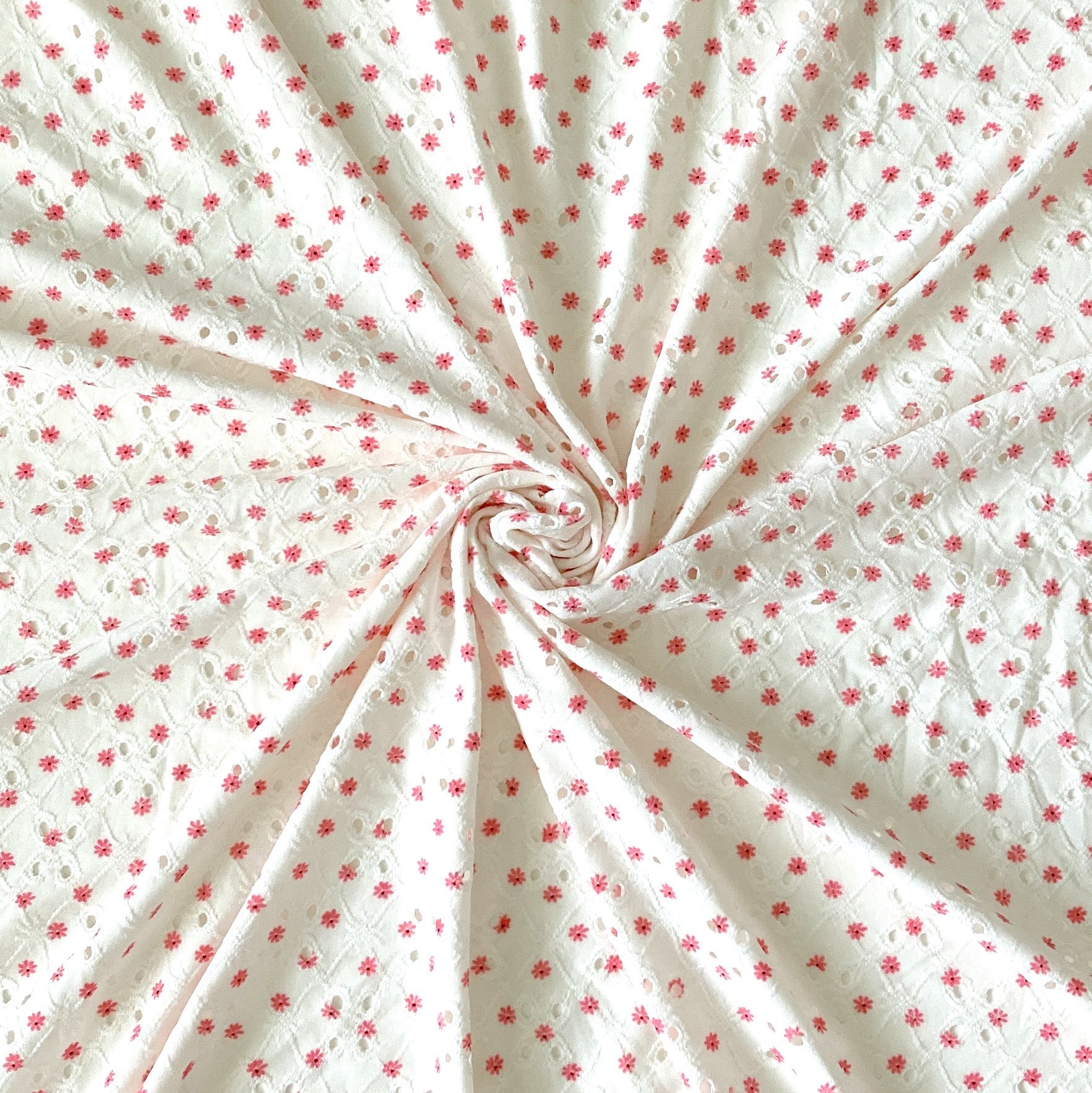 Off White and Salmon Pink Daisy Print Eyelet Poly Spandex Knit Fabric, Raspberry Creek Fabrics, watermarked, restored