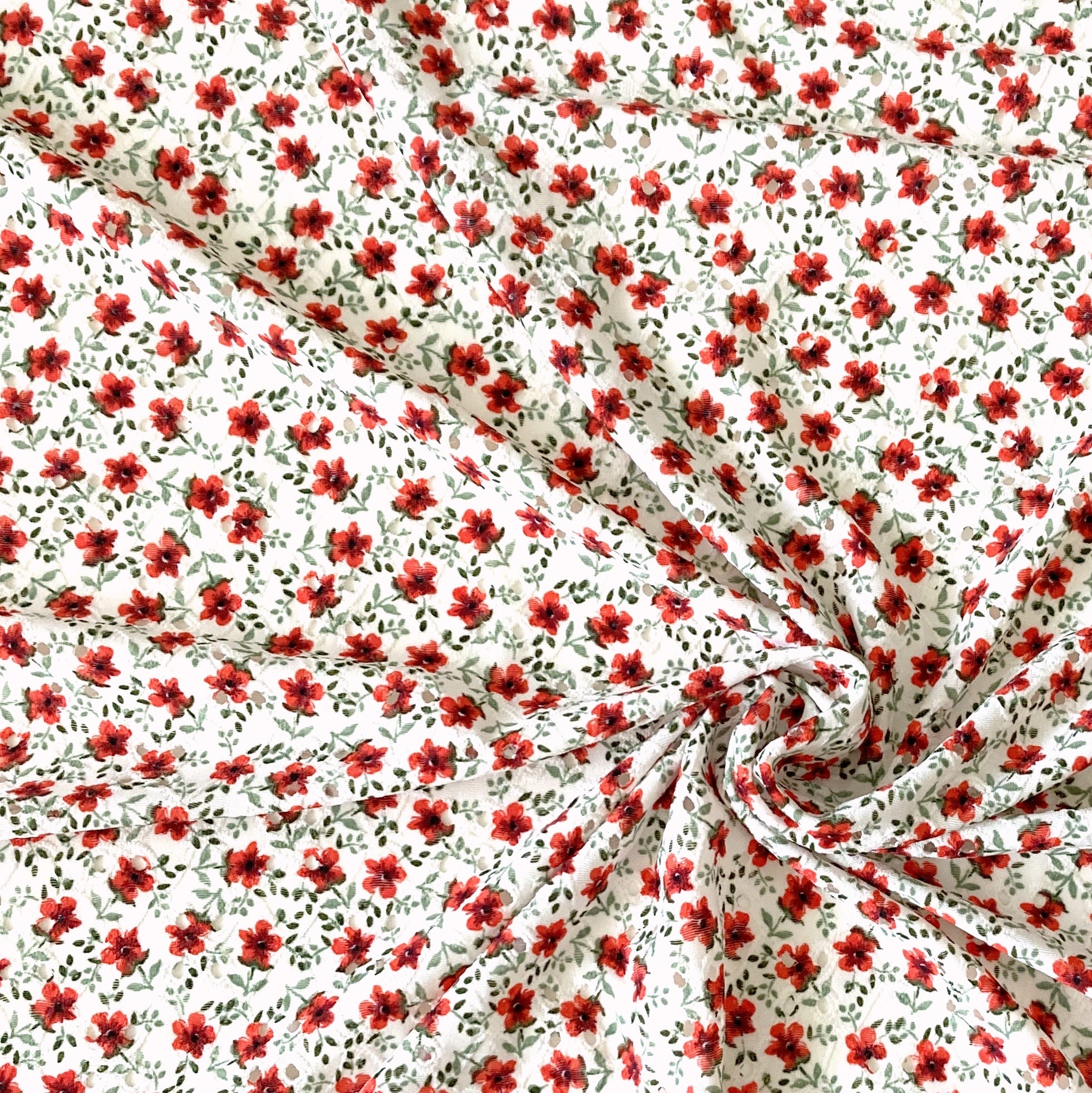 White Sage and Red Pansy Floral Print Eyelet Poly Spandex Knit Fabric, Raspberry Creek Fabrics