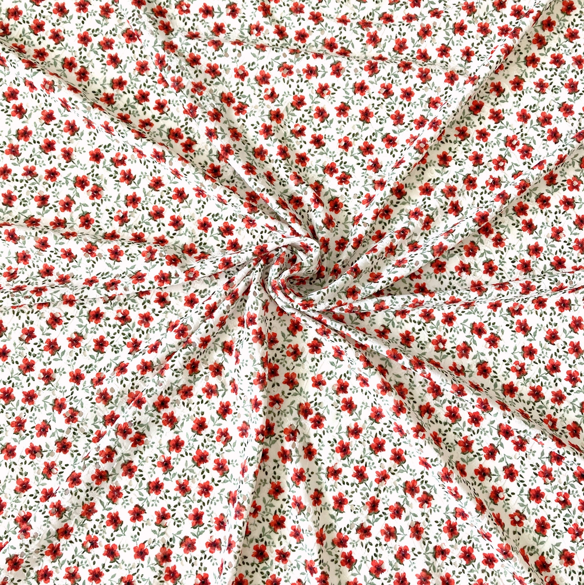 White Sage and Red Pansy Floral Print Eyelet Poly Spandex Knit Fabric, Raspberry Creek Fabrics, watermarked, restored