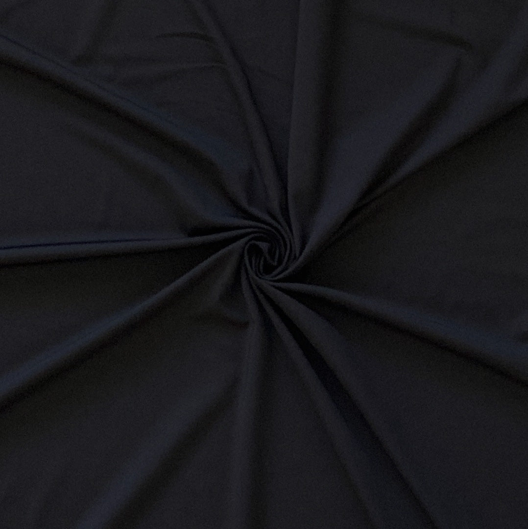 Solid Black 4 Way Stretch Moisture Wicking Athletic Performance Knit Fabric Fabric, Raspberry Creek Fabrics, watermarked, restored